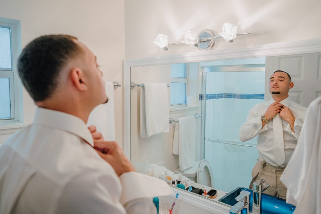 grand cayman wedding photographer groomsmen getting ready