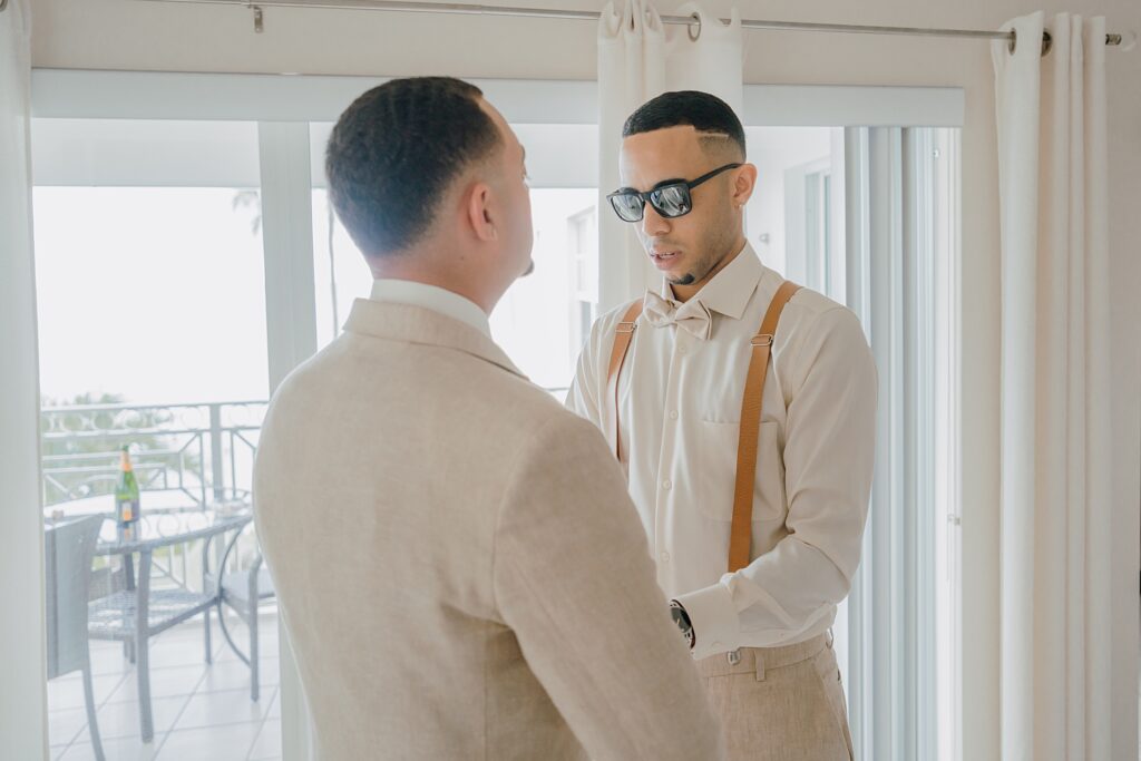 grand cayman wedding photographer groomsmen getting ready