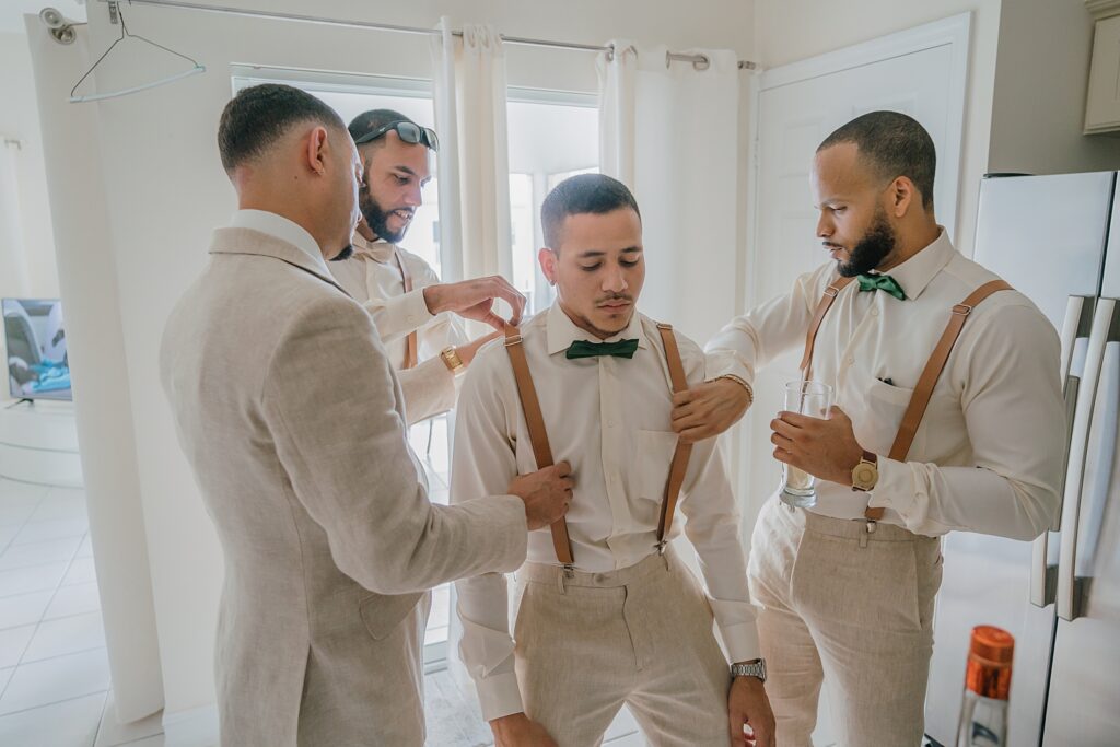 grand cayman wedding photographer groomsmen getting ready