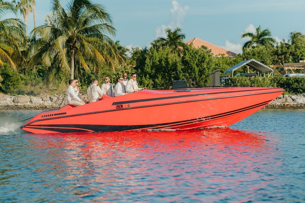 grand cayman wedding photographer morgans groom arrival boat