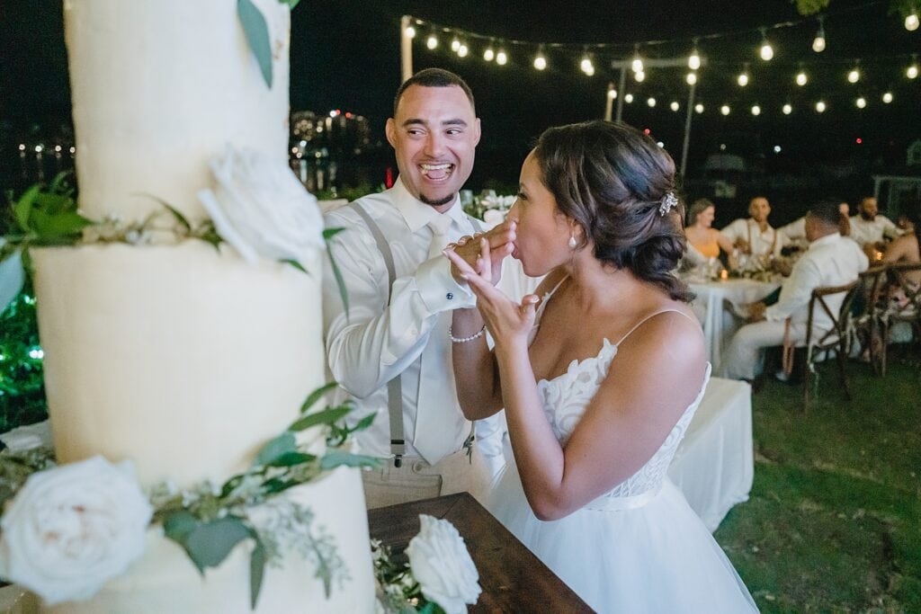 grand cayman wedding photographer reception morgans cake cutting