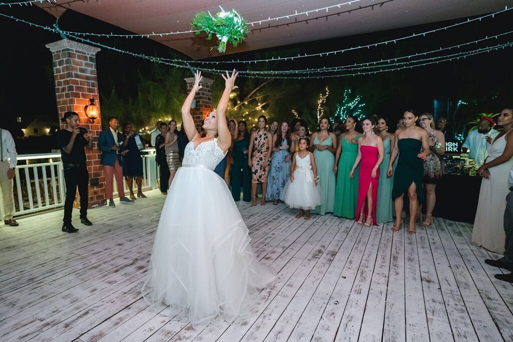 grand cayman wedding photographer reception morgans bouquet toss