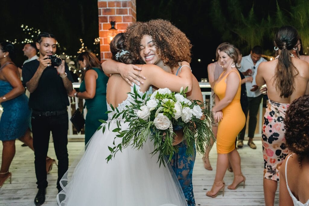 grand cayman wedding photographer reception morgans bouquet toss