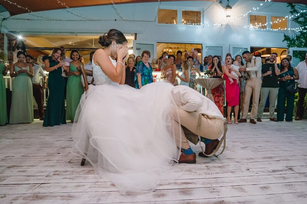 grand cayman wedding photographer reception morgans garter toss