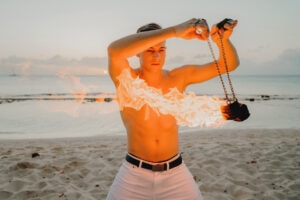 fire crew spinning cayman islands beach portrait photography