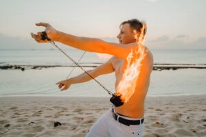 fire crew spinning cayman islands beach portrait photography