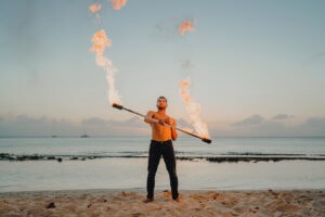 fire crew spinning cayman islands beach portrait photography