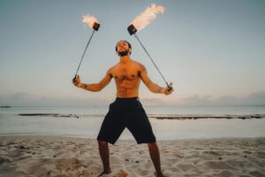 fire crew spinning cayman islands beach portrait photography