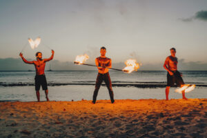 fire crew spinning cayman islands beach portrait photography