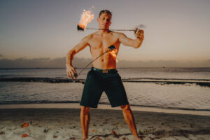 fire crew spinning cayman islands beach portrait photography