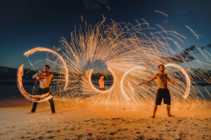 fire crew spinning cayman islands beach portrait long exposure photography