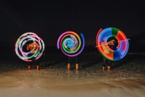 fire crew spinning cayman islands beach portrait long exposure photography