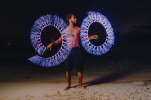 fire crew spinning cayman islands beach portrait long exposure photography