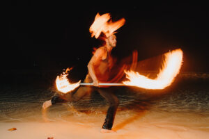 fire crew spinning cayman islands beach portrait long exposure photography