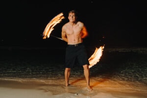 fire crew spinning cayman islands beach portrait long exposure photography