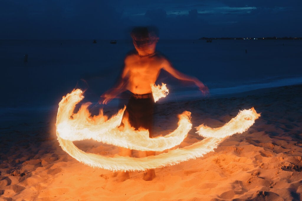 grand cayman beach portrait photography fire spin dance