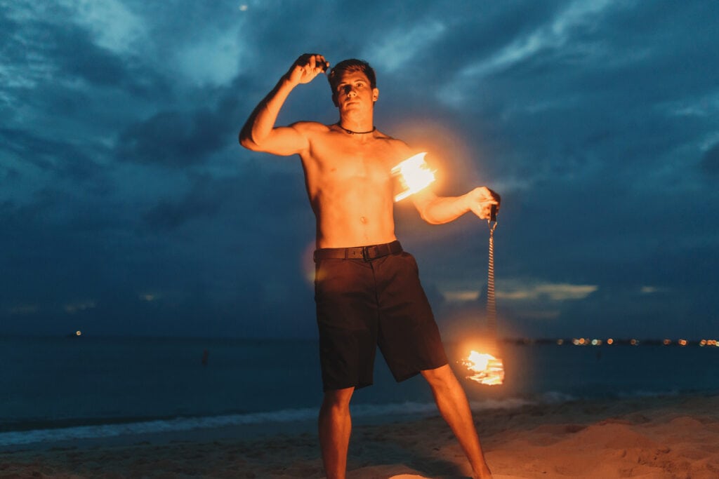 grand cayman beach portrait photography fire spin dance