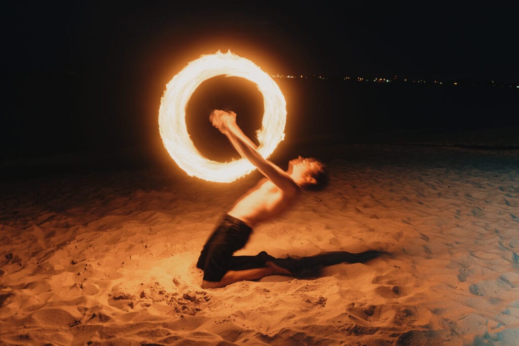 grand cayman beach portrait photography fire spin dance long exposure