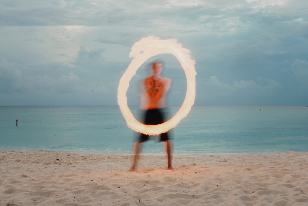 grand cayman beach portrait photography fire spin dance