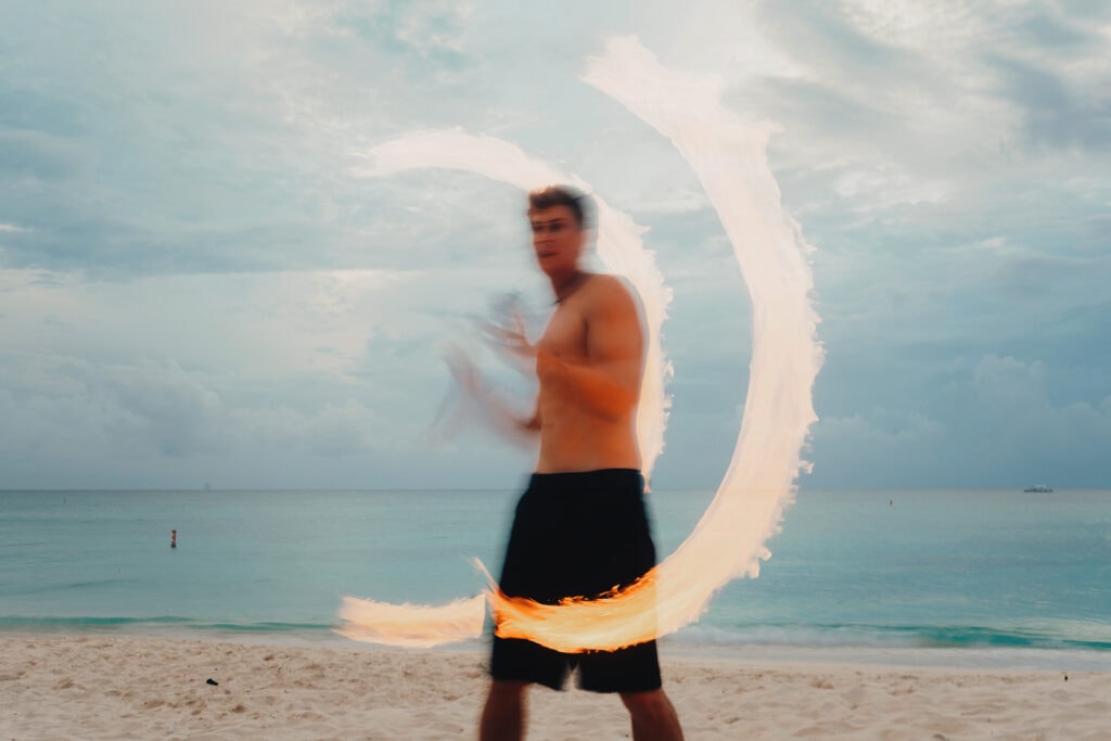 grand cayman beach portrait photography fire spin dance