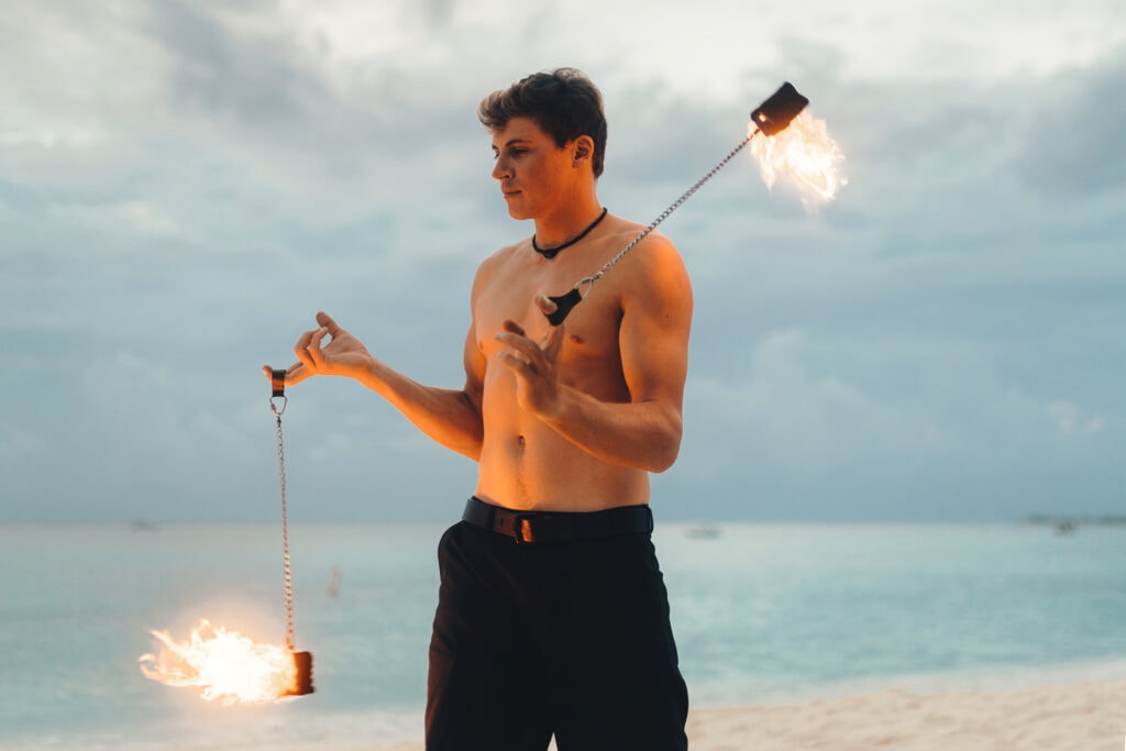 grand cayman beach portrait photography fire spin dance