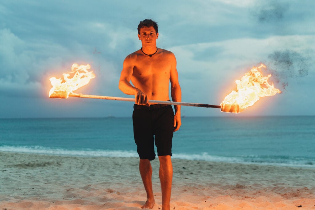 grand cayman beach portrait photography fire spin dance