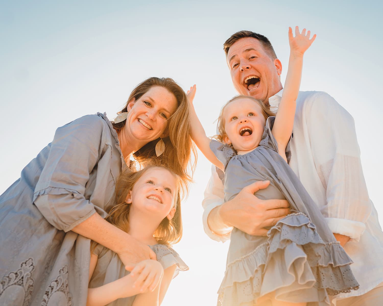 grand cayman islands family photography seven mile beach happy daughters kids