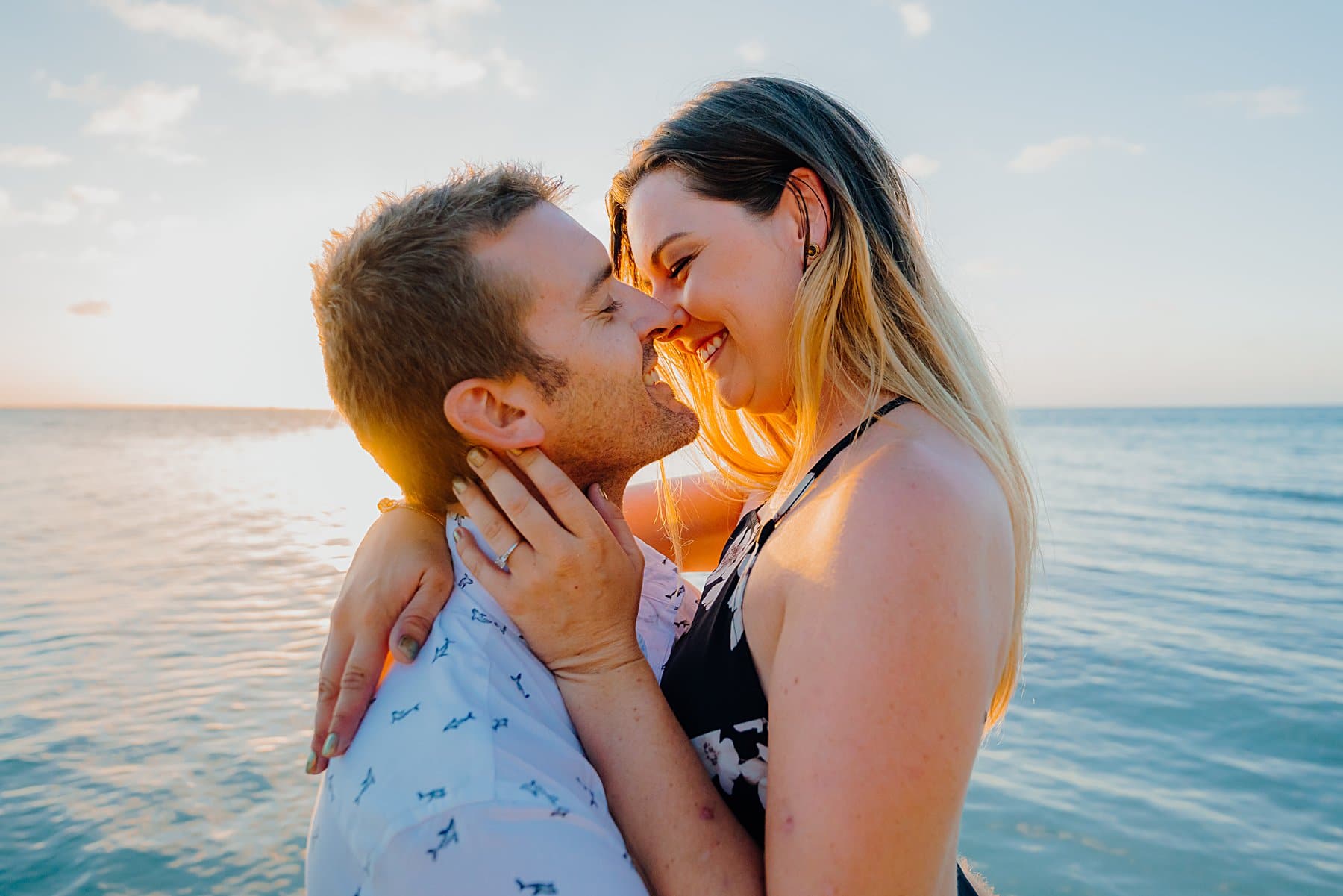 auckland couple engagement photographer beach sunset