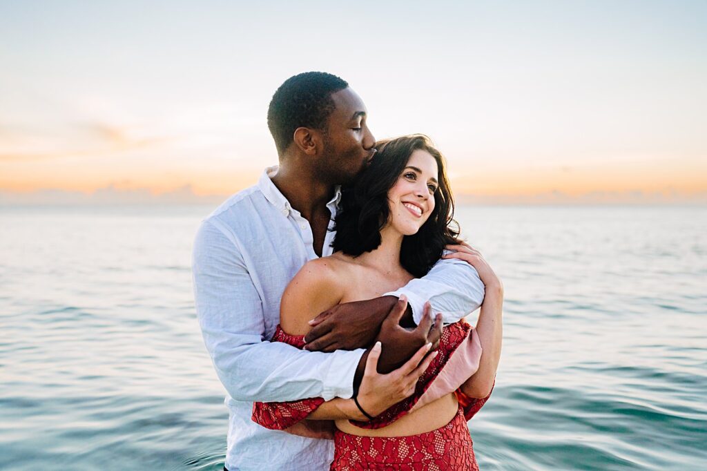 auckland couple engagement photographer beach sunset