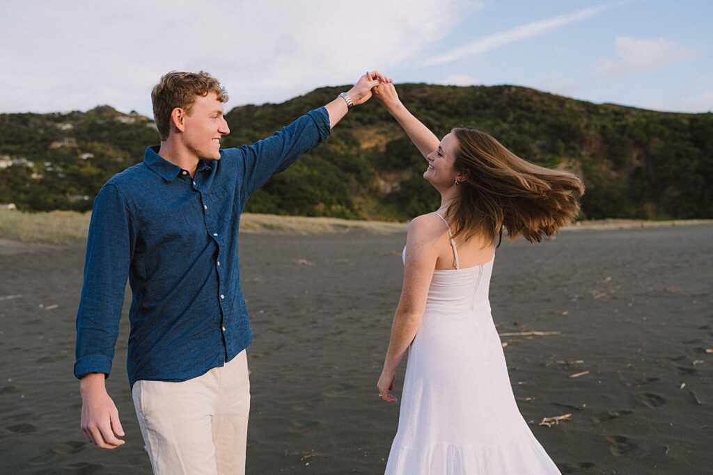 Piha beach auckland couple engagement photographer
