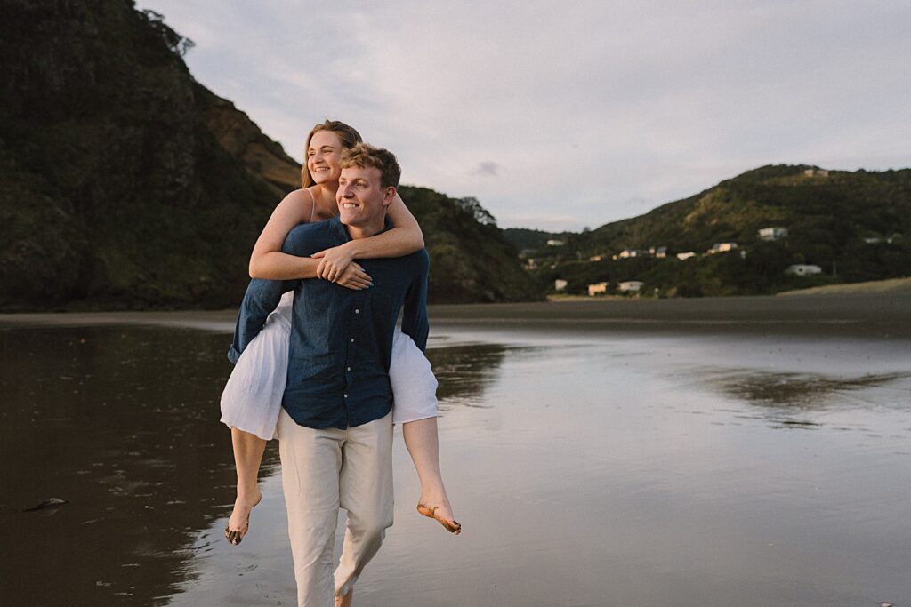 Piha beach auckland couple engagement photographer