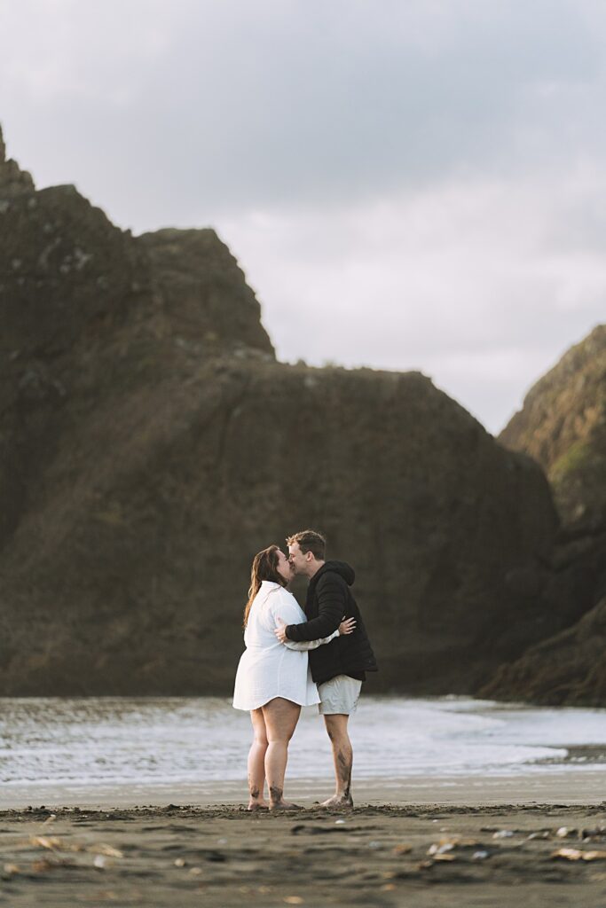 Surprise proposal piha beach auckland engagement photographer