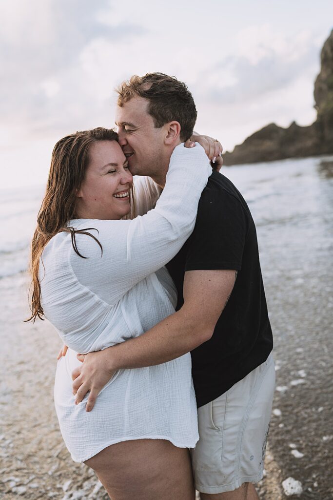 Surprise proposal piha beach auckland engagement photographer