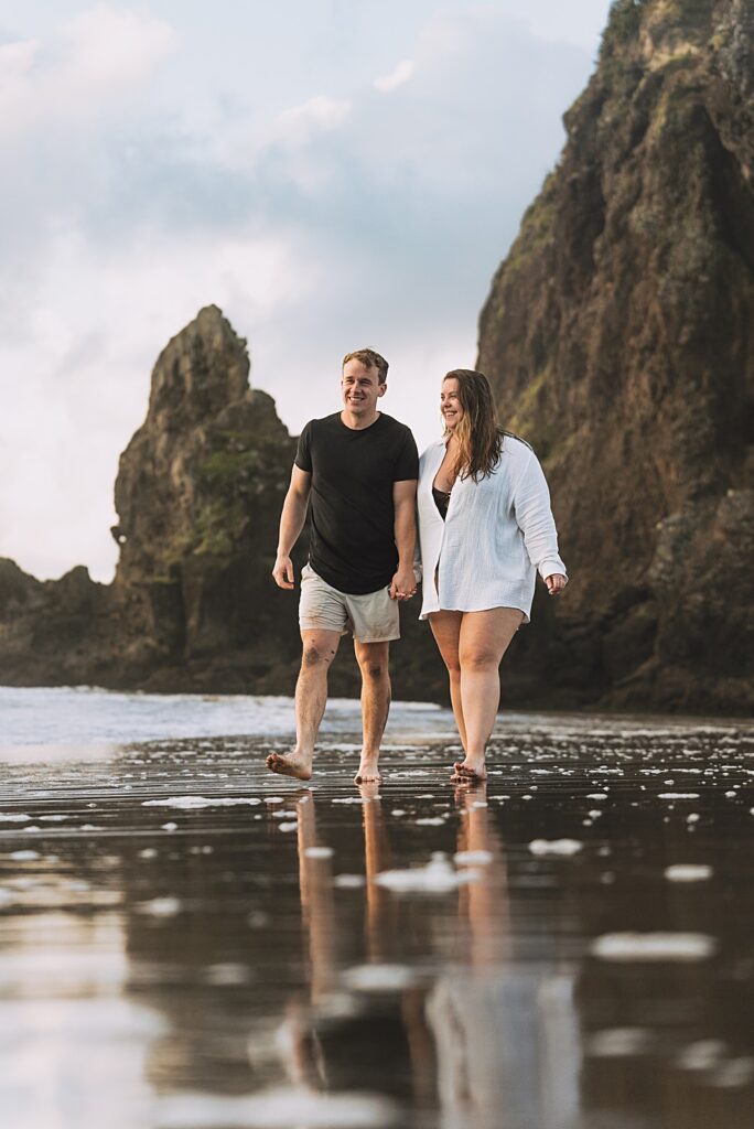 Surprise proposal piha beach auckland engagement photographer