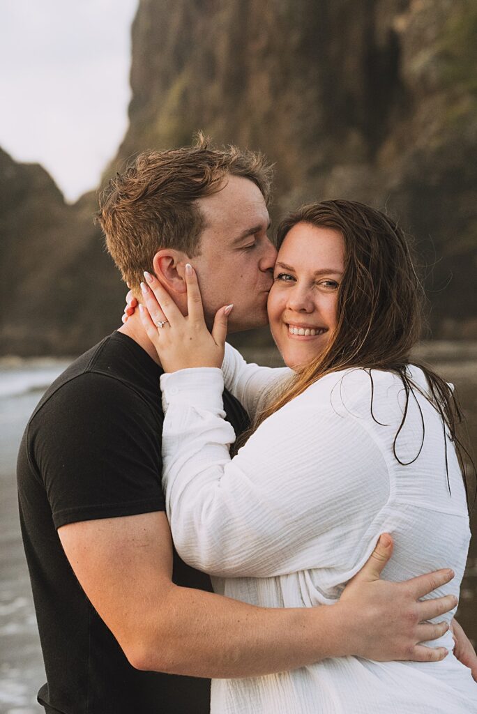 Surprise proposal piha beach auckland engagement photographer