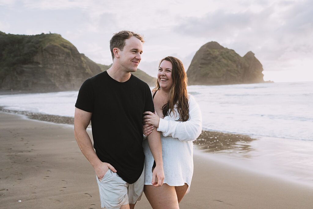 Surprise proposal piha beach auckland engagement photographer
