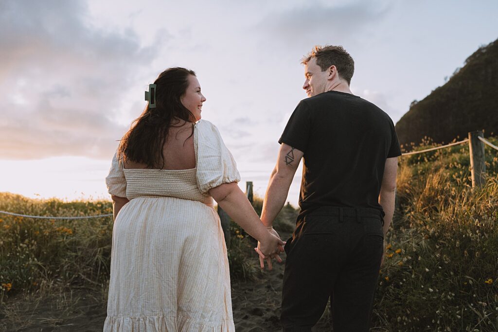 Surprise proposal piha beach auckland engagement photographer