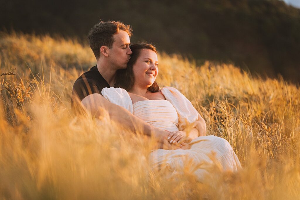 Surprise proposal piha beach auckland engagement photographer