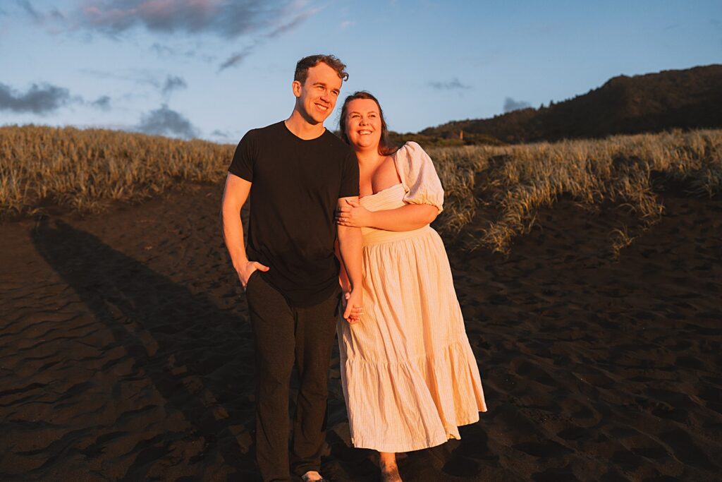 Surprise proposal piha beach auckland engagement photographer