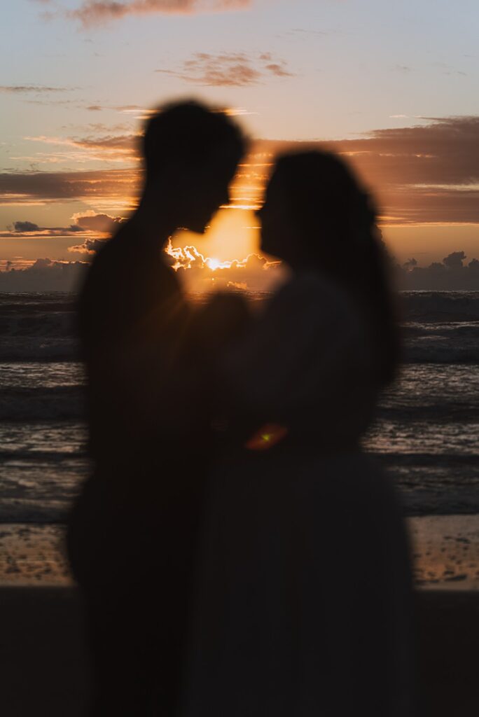 Surprise proposal piha beach auckland engagement photographer